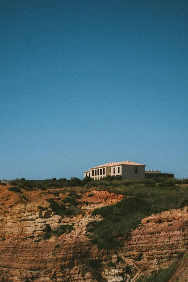 Aethos Ericeira exterior on the red clifftop