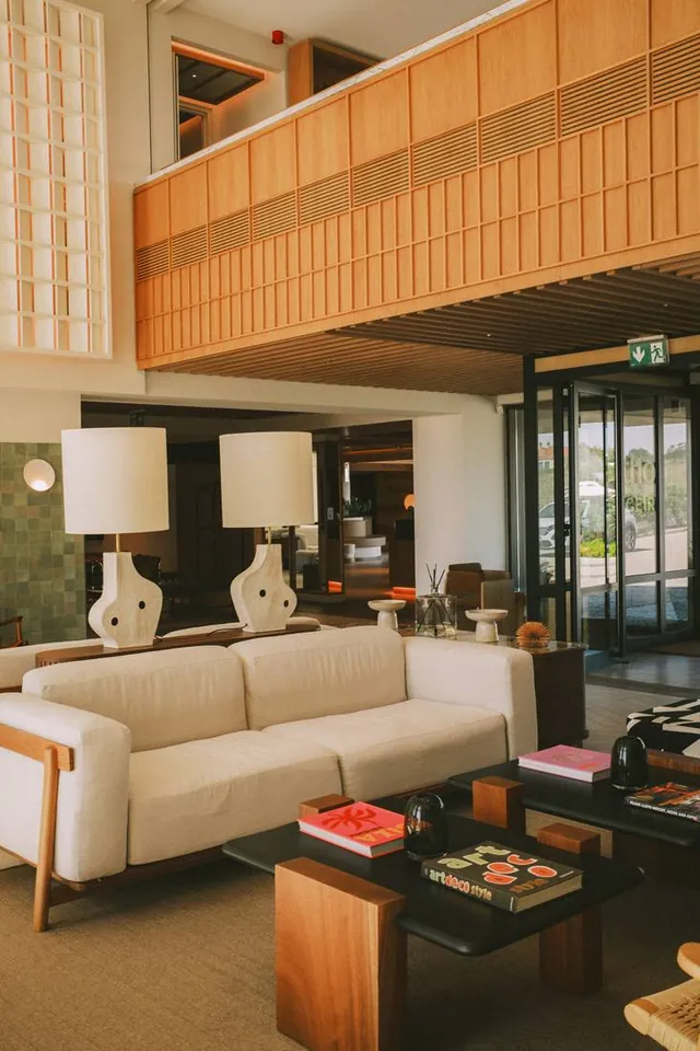 Mid-century lobby with sculptural lamps